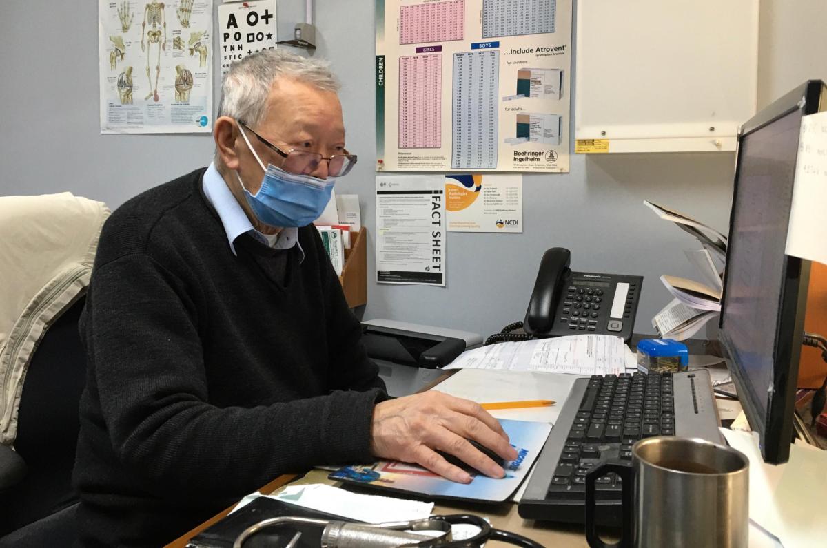 Dr Chi Wing Lai OAM was awarded the Medal of the Order of Australia. He is pictured at work as a general practitioner. 